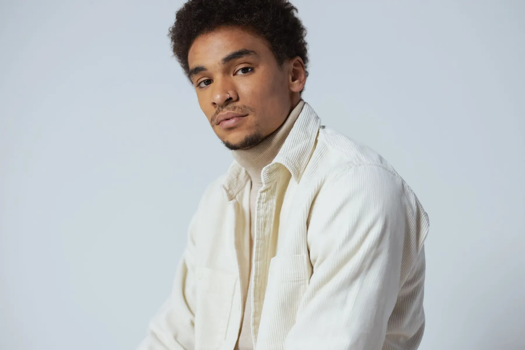 Close portrait in the ecru overshirt